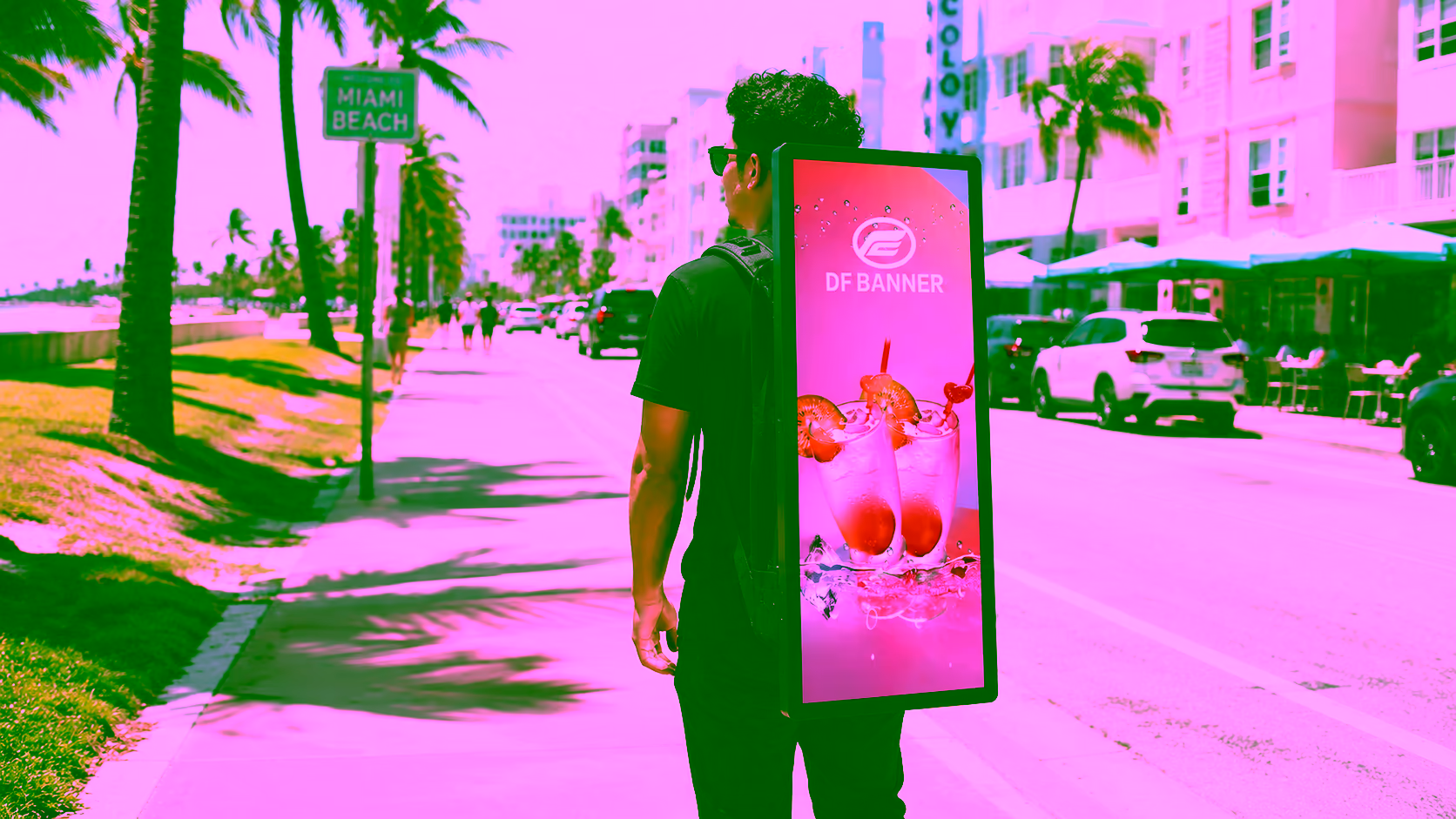 Street team member walking Miami Beach with an illuminated backpack billboard